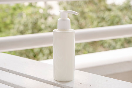 skin care cream or sun block mockup bottle, hotel terrace or balcony