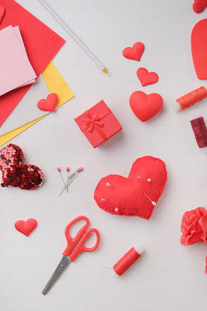 Creative crafts for valentines day. top view of craft for valentines day, red heart shape pin cushionの写真素材