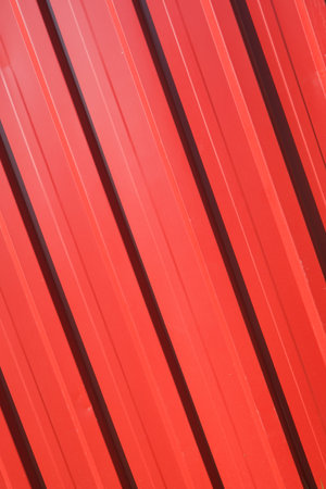 background metal leaf vivid red , iron profile textureの写真素材
