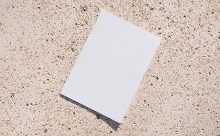 empty magazine mockup on concrete stone floor or pavement outdoors. For advertising, brand design,...