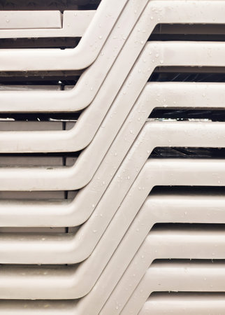 pile of lounge chairs after rain with raindrops, geometric minimalの写真素材