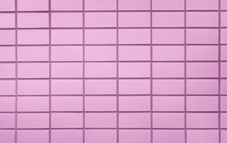 Brick wall with pink brick, pink brick background.の写真素材