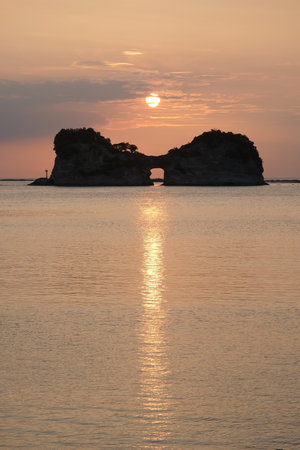 Wakayama Shirahama Scenic spot of Engetsu Island , Japan. Setting sun and reflection in the oceanの写真素材