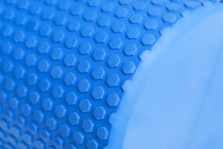 blue massage foam roller or MFR roll for myofascial releasetexture closeupの写真素材