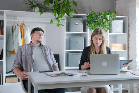 Teamwork meeting, tablet and business people in office workplace. millennial man and woman working...