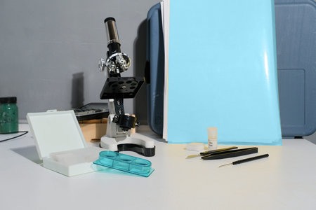 Small microscope for children on the desk, homework at home, education and exploration for kids