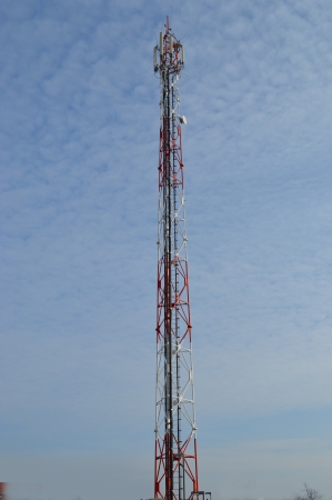 Antenna tower for mobile phone with blue sky background の写真素材