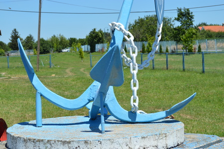 Old anchor. Marina in background.の写真素材