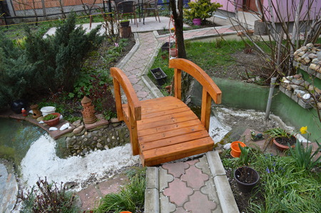 Miniature bridge and footpath with river belowの写真素材