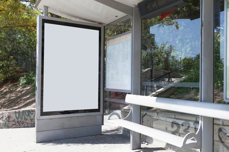 Blank billboard on bus stop in the city. 3d renderingの写真素材