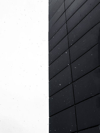 abstract background of black and white brick wall with snowflakes