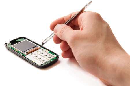 Mobile phone repair service with engineers hands working
