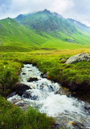 Mountain landscape with a river in Caucasusの写真素材