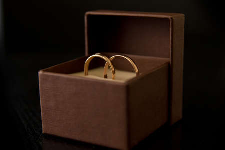 Photo of two wedding rings in boxの写真素材