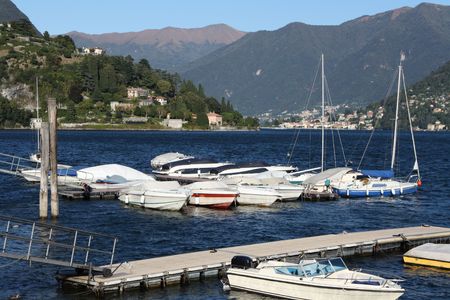 The little harbour in Cernobbio, a beautiful town stretched out along Como lake, in the North of Italyの写真素材