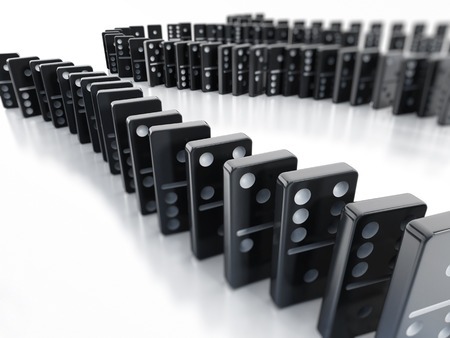 Dominoes in a row isolated on white background.の写真素材