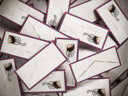 Stack of enveloppes. My own image used as stamp.の写真素材