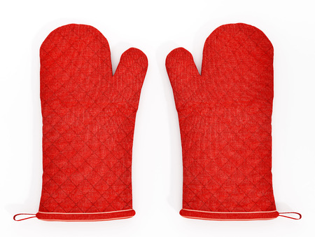 Red kitchen gloves isolated on white background.の写真素材