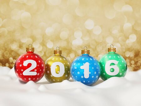 2016 text on multi colored christmas baubles standing on snow