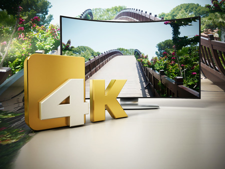 4K Ultra HD television on a bridge and sky setting. 3D illustration.の写真素材