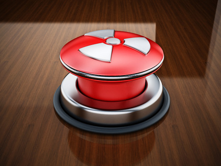 Nuclear launch button on reflective wooden table.. 3D illustration.の写真素材