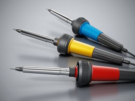 Soldering irons on gray surface. 3D illustration.