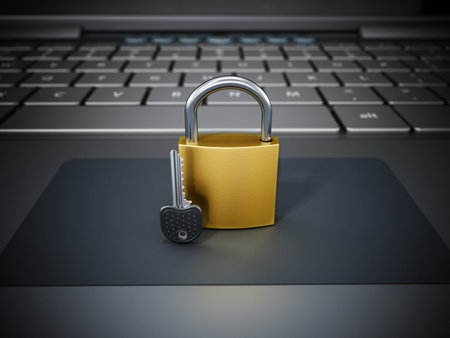 Padlock and key standing on laptop computer. 3D illustration.の写真素材