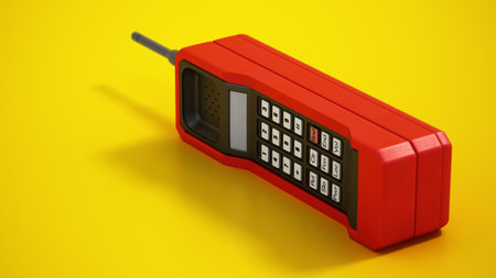 Retro cellphone isolated on yellow background. 3D illustration.の写真素材