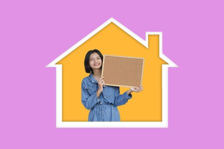Happy asia girl enjoy life at home with purple background.の写真素材