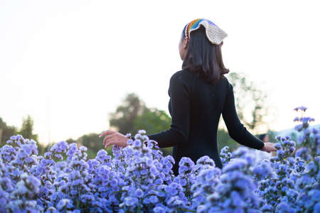Asian young girl with Margaret farm.