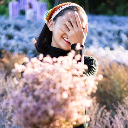 Girl with beautiful flower at flower park.