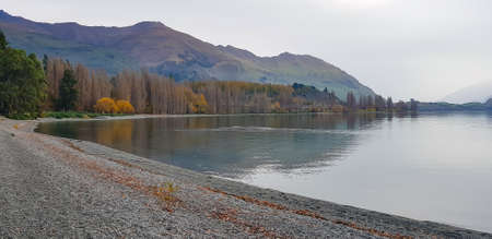Panorama view landscape view at Wanaka lake New zealand in autumn.の写真素材