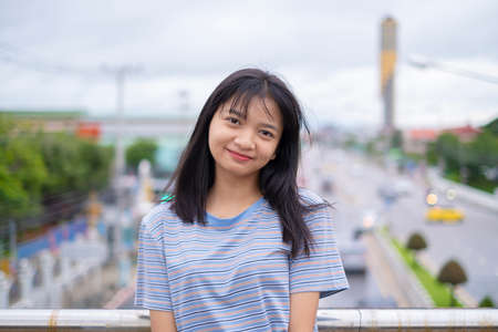 Portrait happy young asian girl, smile girl out door.の写真素材