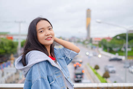 Portrait happy young asian girl, smile girl out door.の写真素材
