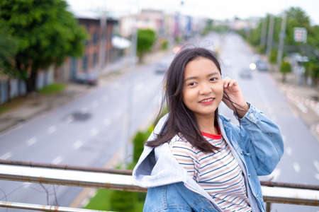 Portrait happy young asian girl, smile girl out door.の写真素材