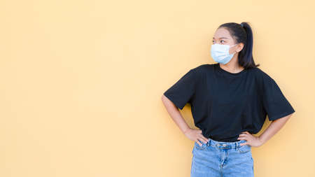 Portrait young girl wear black shirt on brown background.の写真素材
