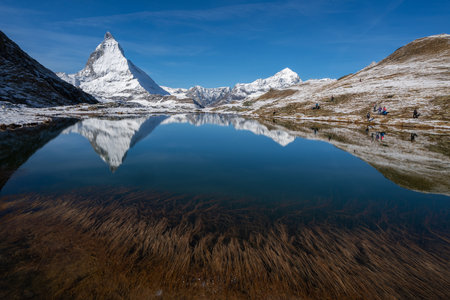 Matterhorn Beautiful Swiss alps with reflection at Riffelsee Lake,Switzerland.の写真素材