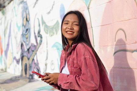 Portrait close-up face Asian young girl with colorful background.の写真素材