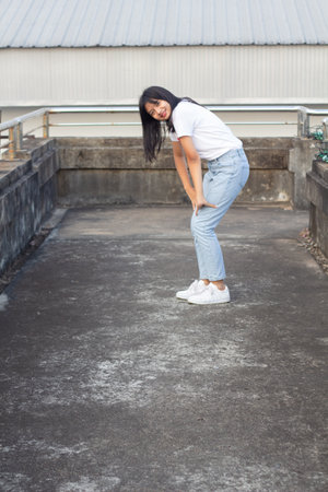 Young girl dance on overpass.の写真素材