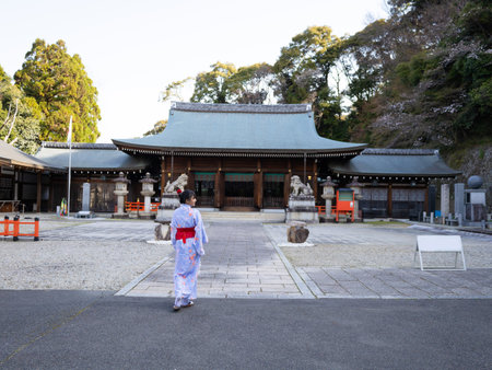 Beautiful tourist girl sightseeing at a shrine in Kyoto Japan.の写真素材