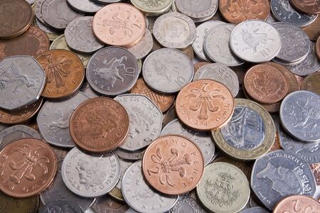 A pile of random used UK coinage