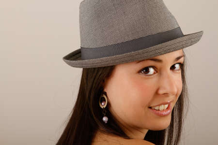 Natural looking brunette wearing a hatの写真素材