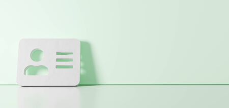 3D rendering of white inverted symbol of address card with person and lines icon leaning on on color wall with floor blurred reflection with empty space on right sideの写真素材