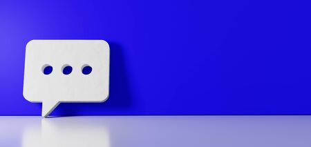 3D rendering of white symbol of rectangular rounded chat bubble with three dots icon leaning on on...