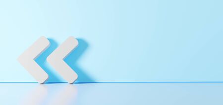 3D rendering of white thick symbol of angle double arrow left with rounded corner icon leaning on on color wall with floor blurred reflection with empty space on right sideの写真素材