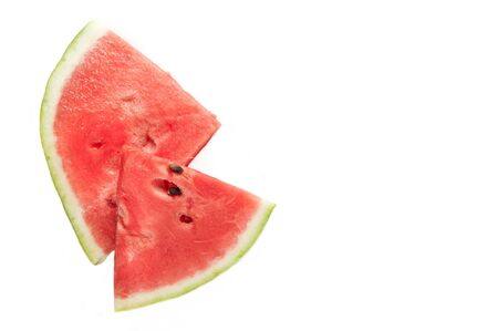 Slices of juicy ripe red watermelon on a white background. Fresh watermelon juice. Cocktails and soft drinks with watermelon.の写真素材