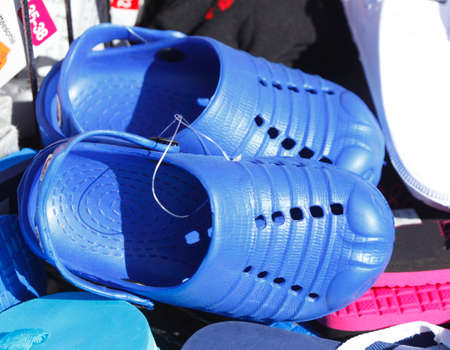 Blue Summer Shoes Shoes at a shoe stand