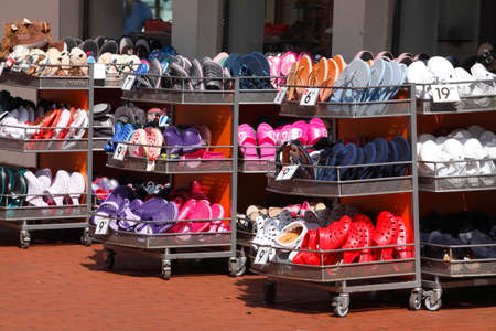 Summer Shoes on a Rack from a  Shoe shopの写真素材