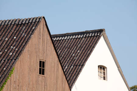House Roofs with wooden House Wall