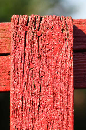 red wooden old garden fenceの写真素材